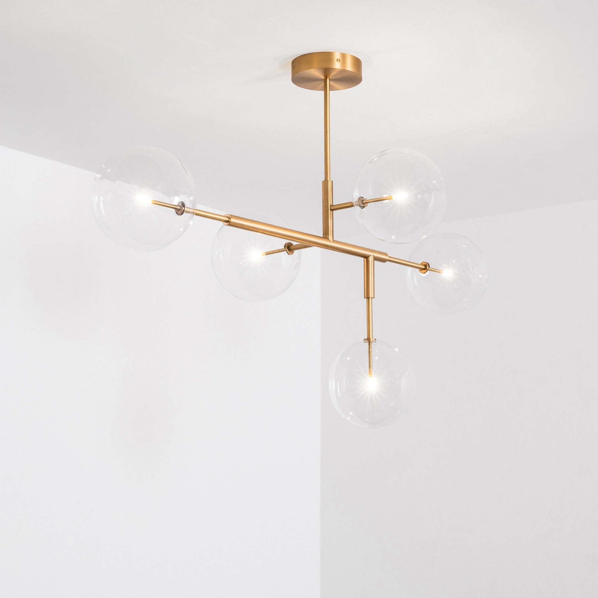 Axis 5-Light Modern Brass Chandelier - Schwung - Luxury Lighting Boutique