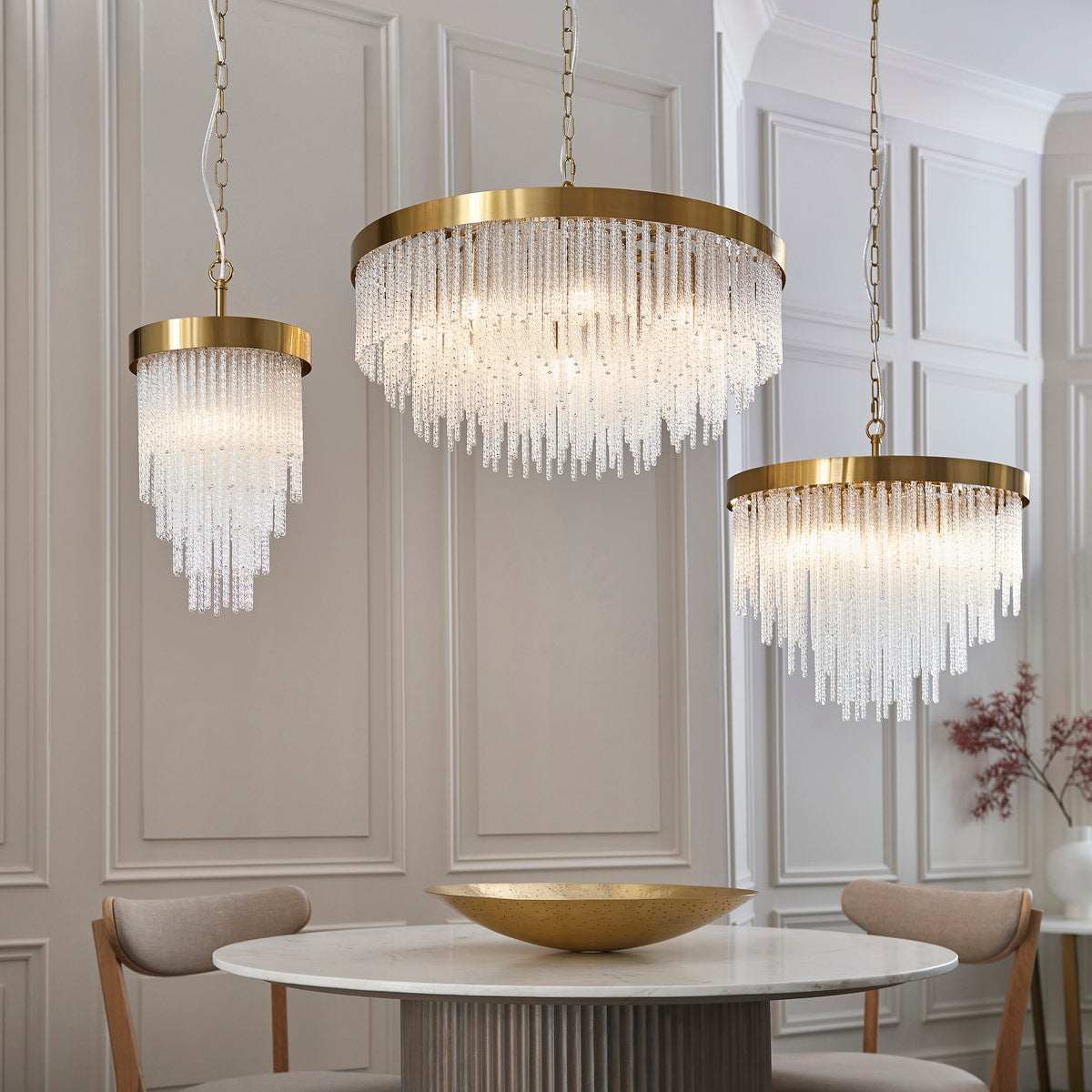Side profile revealing the pendant's generous proportions and dramatic cascading silhouette