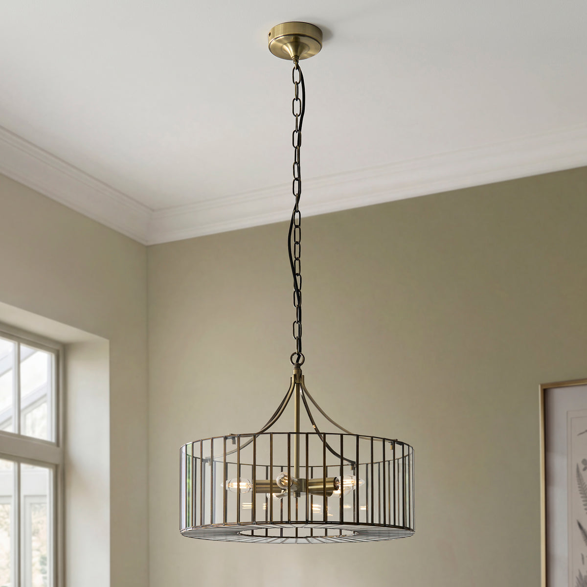 Antalya Pendant showcasing its height-adjustable chain and black fabric cable