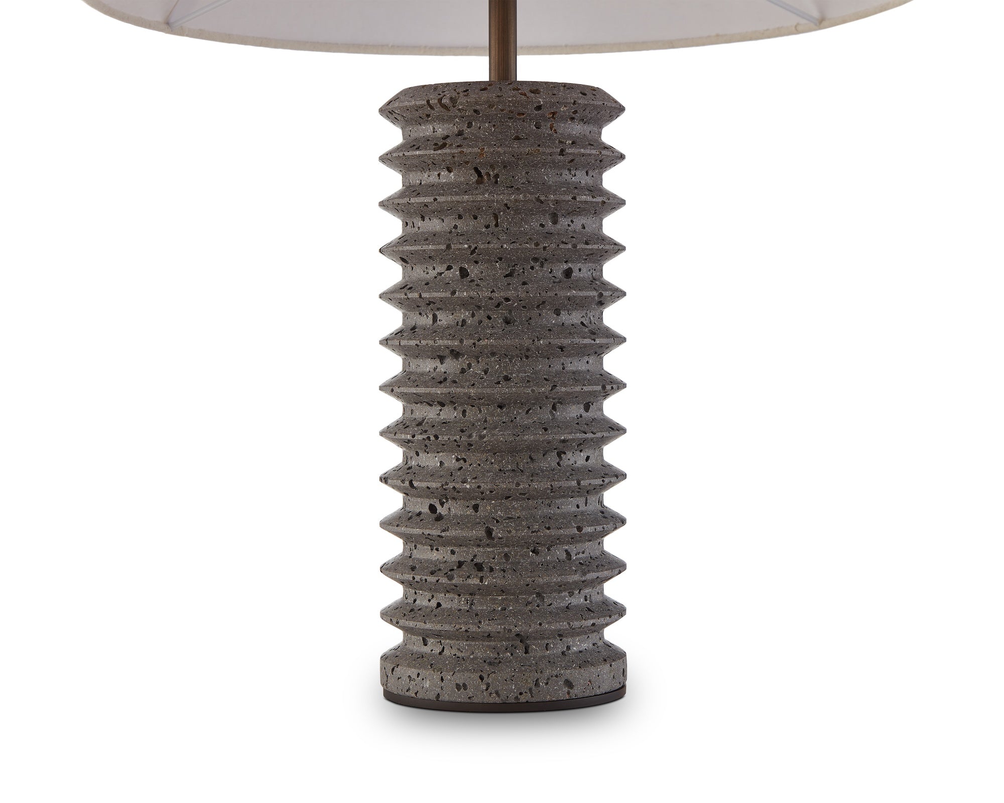 Carson Table Lamp by Liang & Eimil featuring a tiered dark travertine base with antique bronze detailing and a grey linen shade
