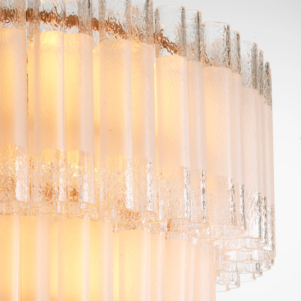 Sculptural antique brass framework and chain of the Denton S Chandelier
