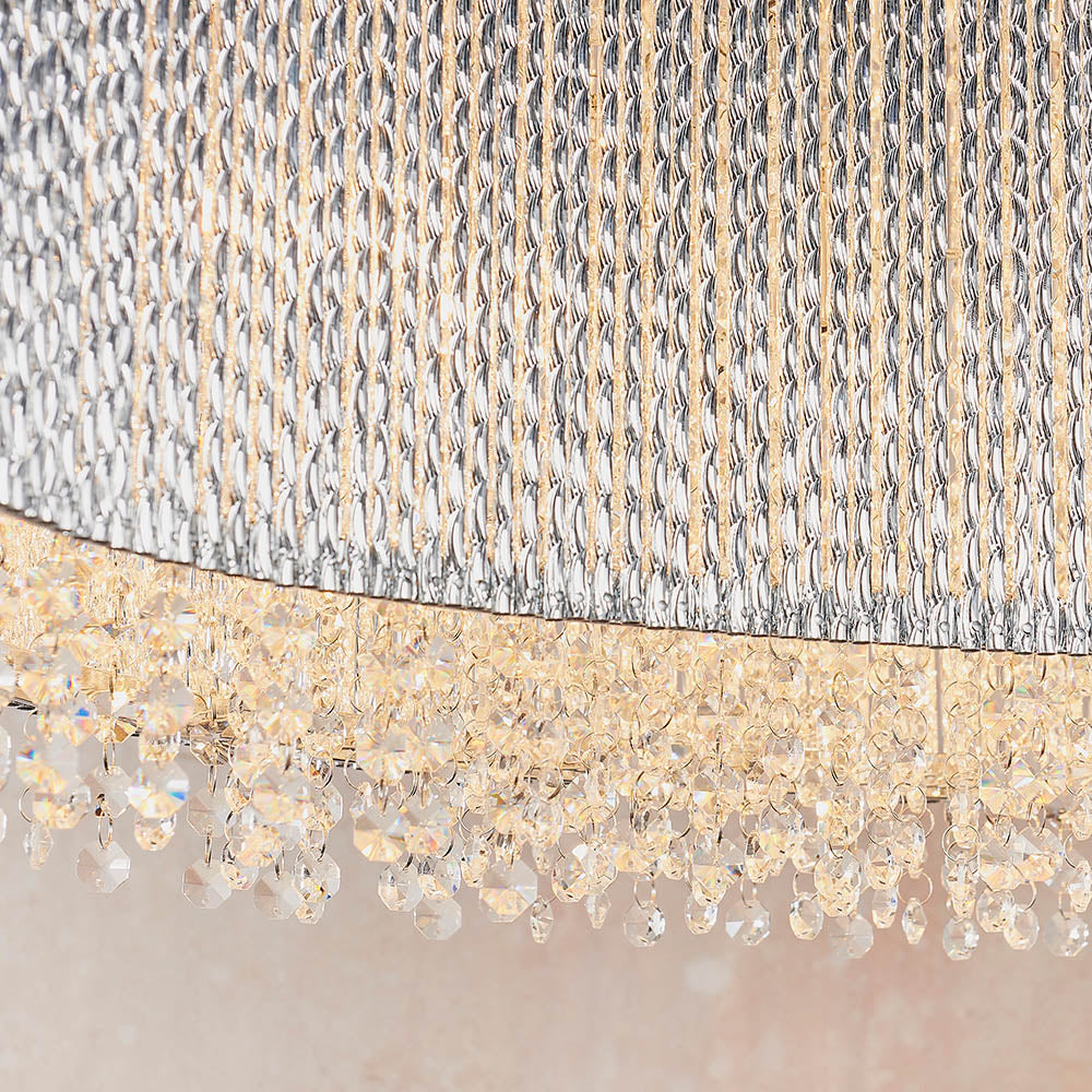 Premium detail highlighting the twisted polished chrome rods forming the sweeping wave design