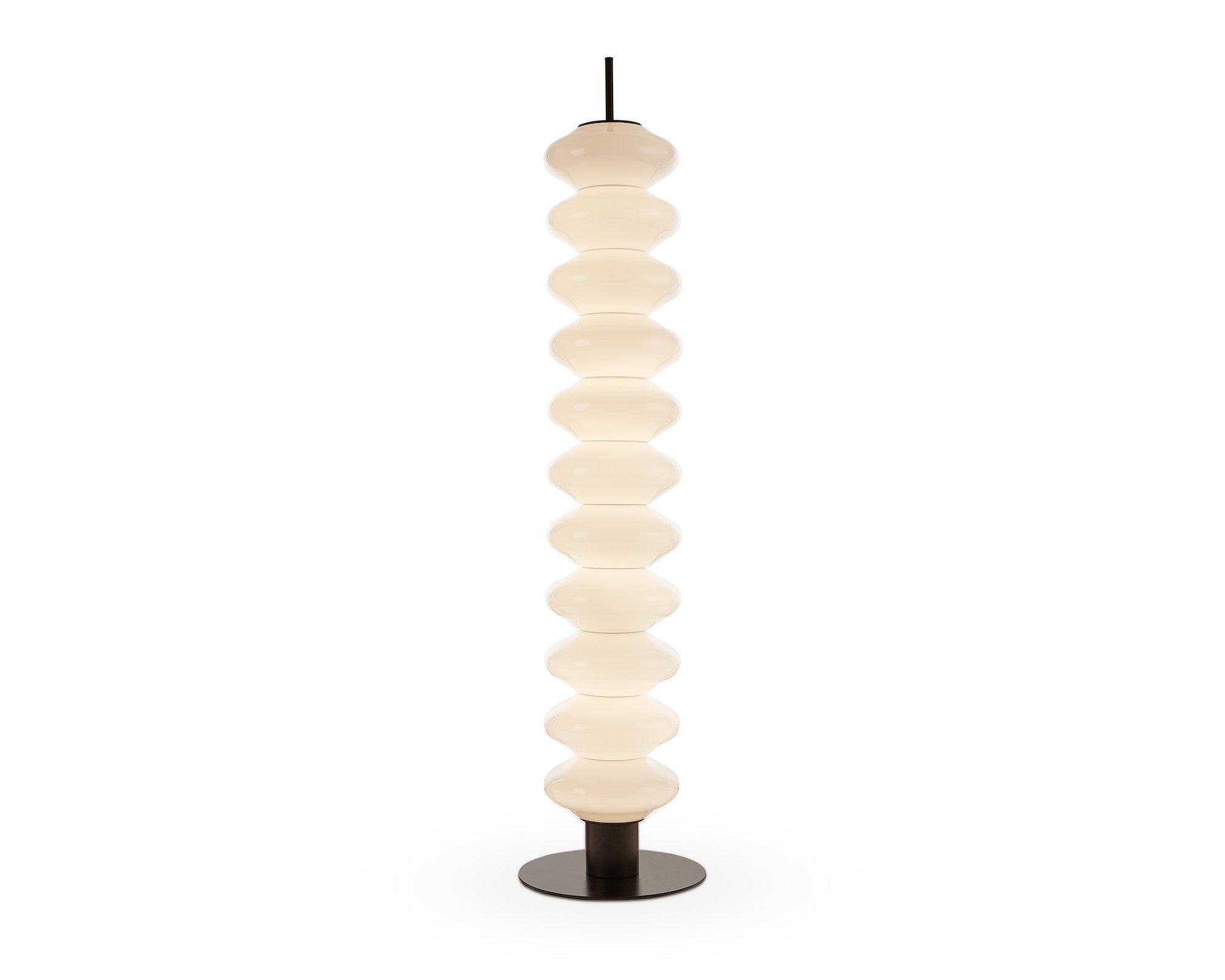 Jana Floor Lamp by Liang & Eimil featuring stacked white glass discs on a black iron frame with integrated LED lighting