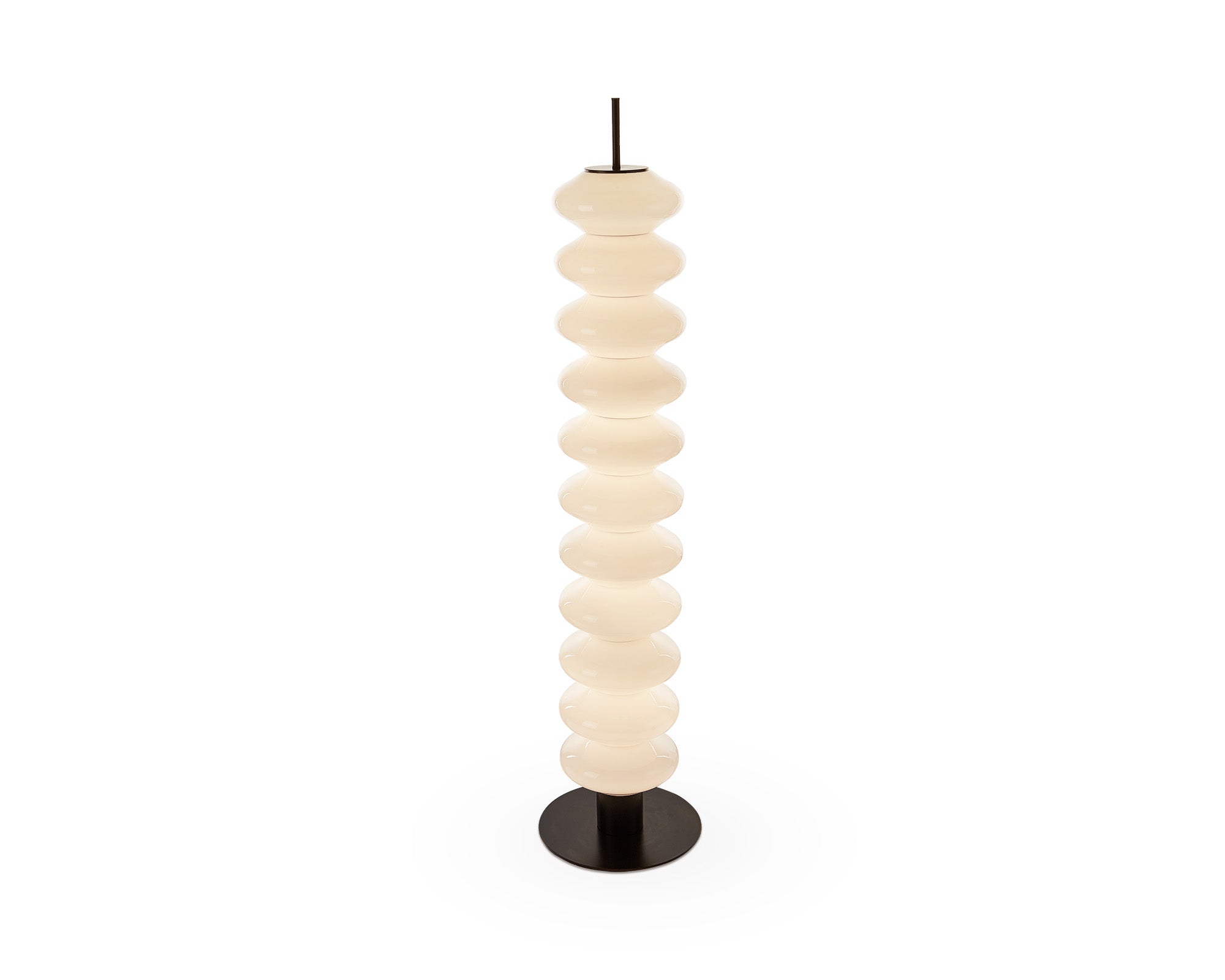 Jana Floor Lamp by Liang & Eimil featuring stacked white glass discs on a black iron frame with integrated LED lighting
