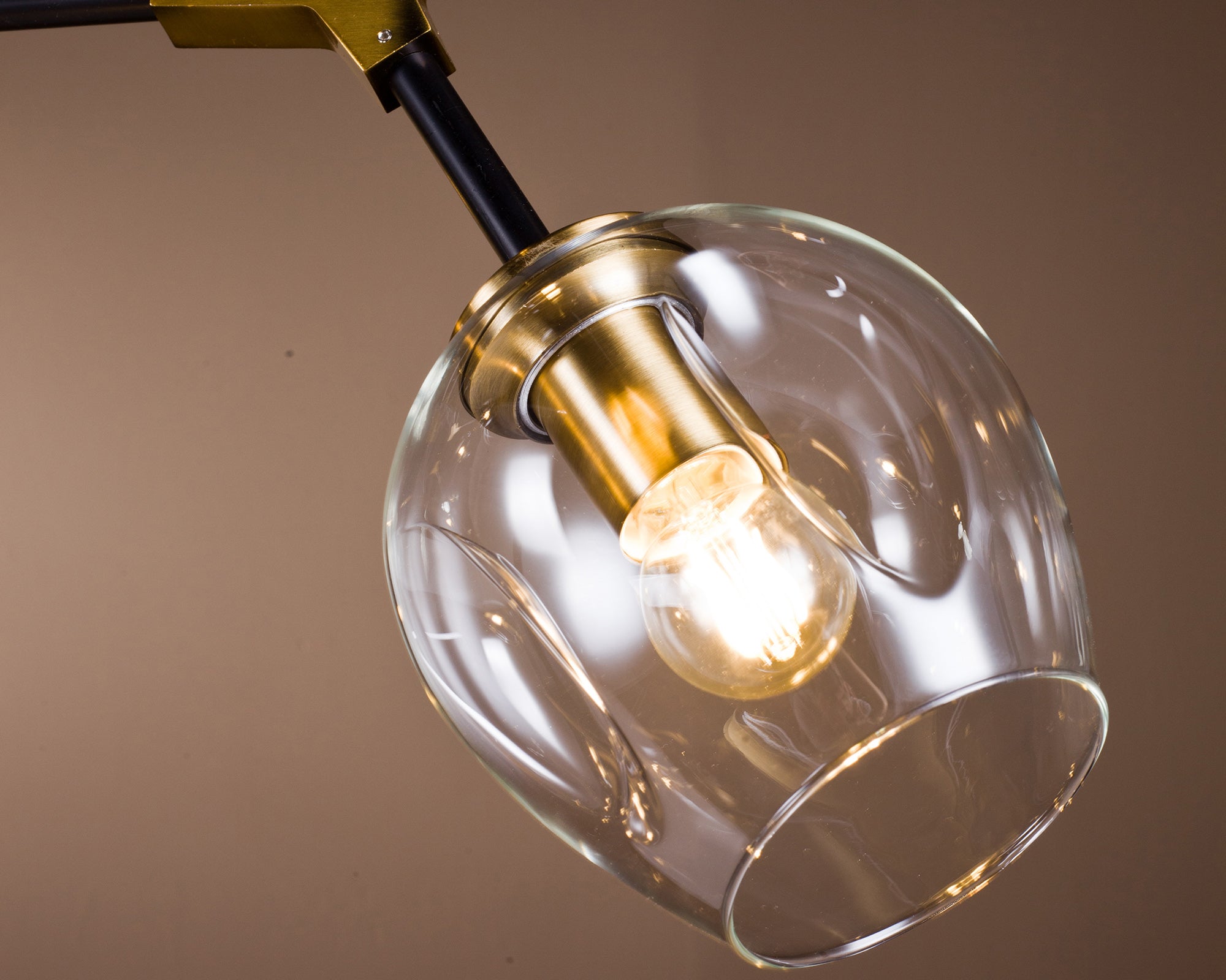 Orbital Pendant Lamp - Liang & Eimil featuring clear glass shades with a matt black metal frame.