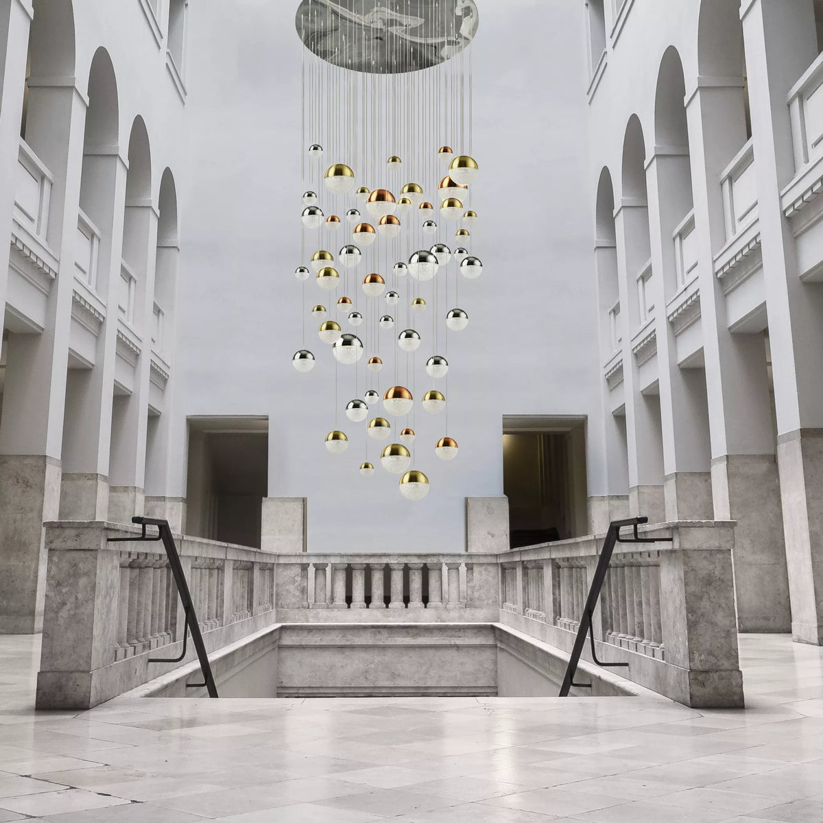 Planets 55Lt Multi-Drop creating a striking focal point within a luxurious high-ceilinged interior