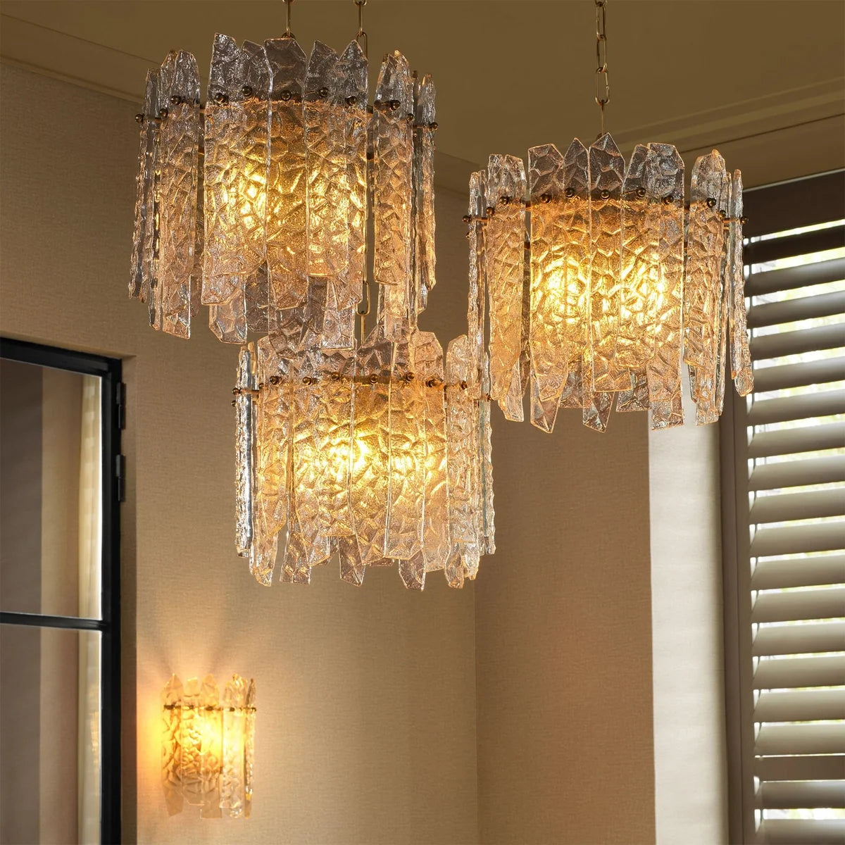 Prati Chandelier creating an elegant focal point within a sophisticated luxury interior.