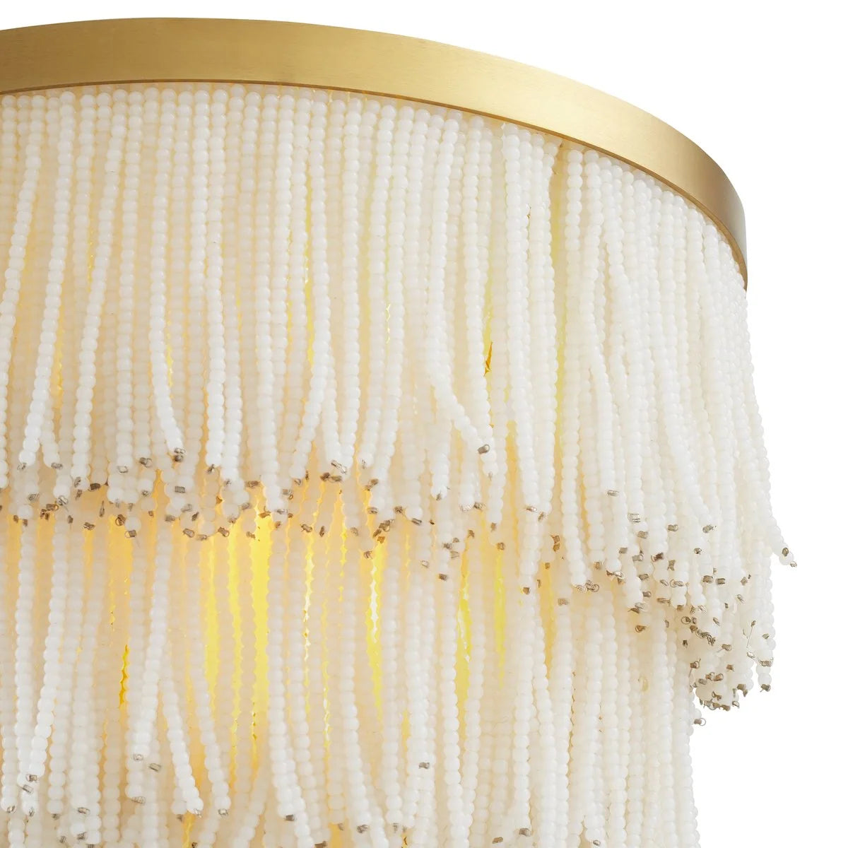 Detailed view of the exquisite white glass beads arranged in an elegant layered composition.