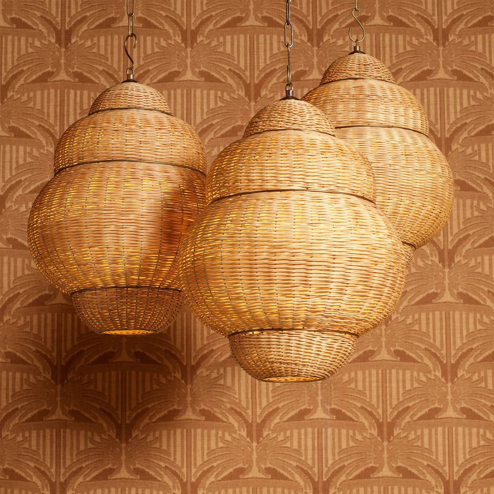 Refined Rowlan Pendant featuring richly textured antiqued rattan construction.