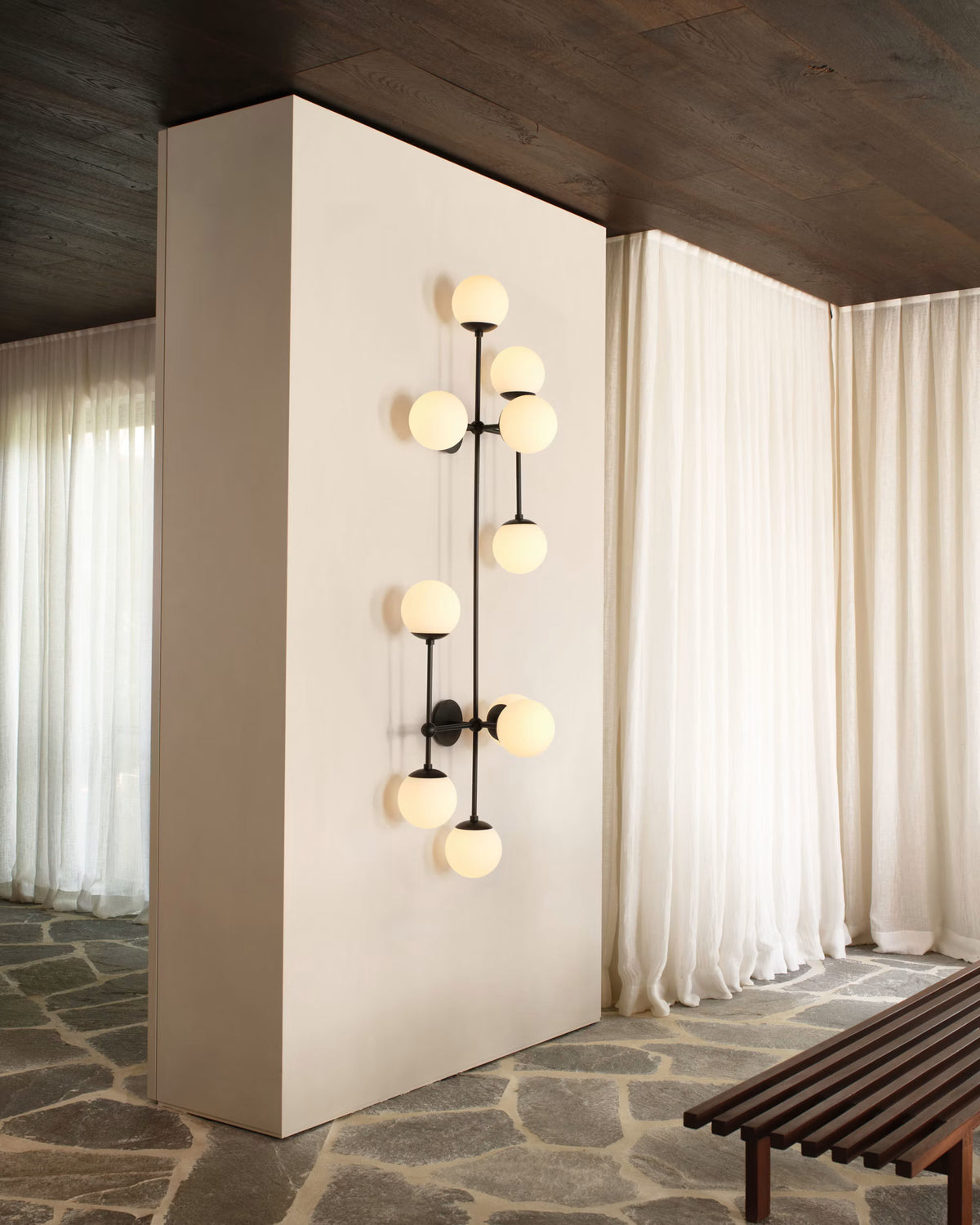 Schwung Armstrong Wall Sconce sculptural design