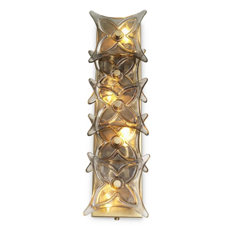 Detailed view of the vintage brass-finish structure of the luxurious Silvaris wall light