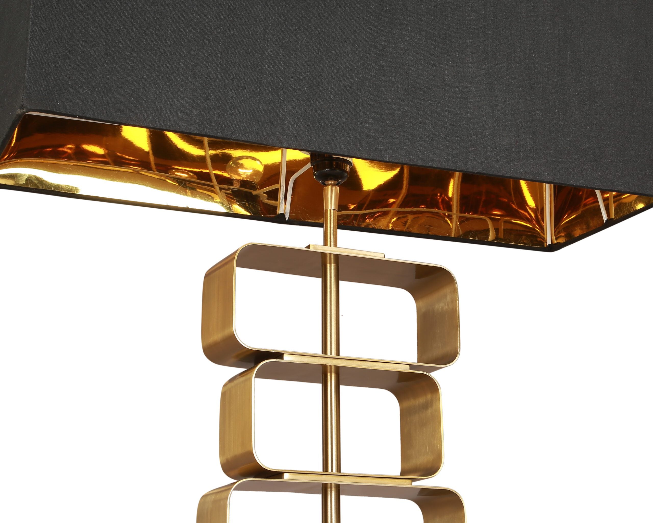Trento Table Lamp by Liang & Eimil featuring a brushed brass stacked rectangle frame and black fabric shade with gold lining