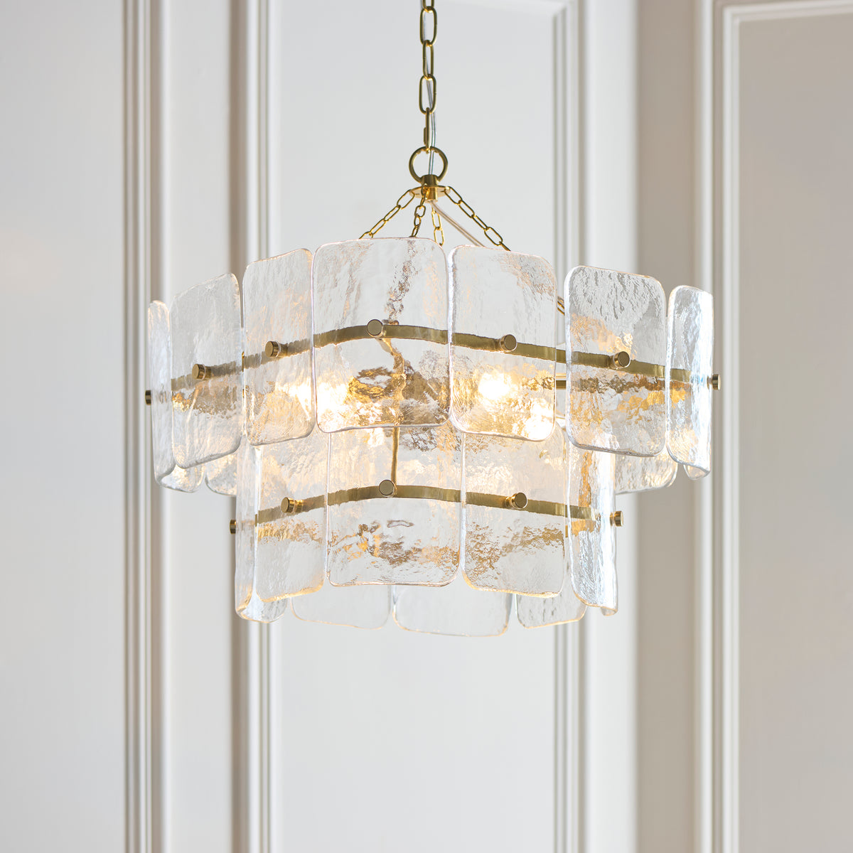 Venice 4Lt Pendant illuminating a refined luxury interior with warm atmospheric light