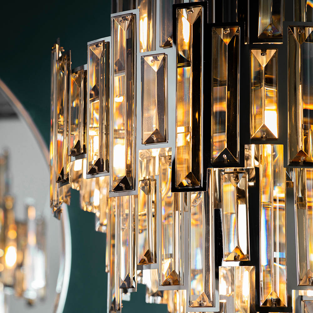 Premium close-up highlighting the interplay of polished chrome and champagne-toned crystal