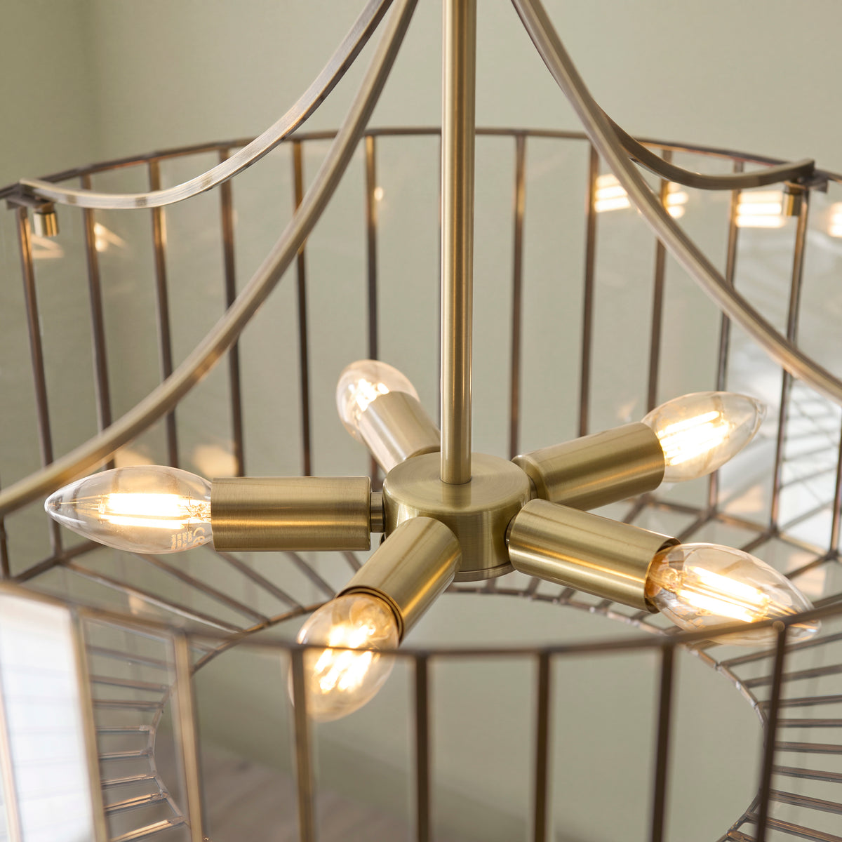 Premium detail view highlighting the combination of antique brass and clear glass
