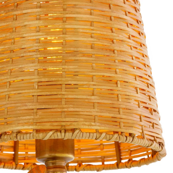 Close-up of the natural rattan shade creating a warm, textured aesthetic