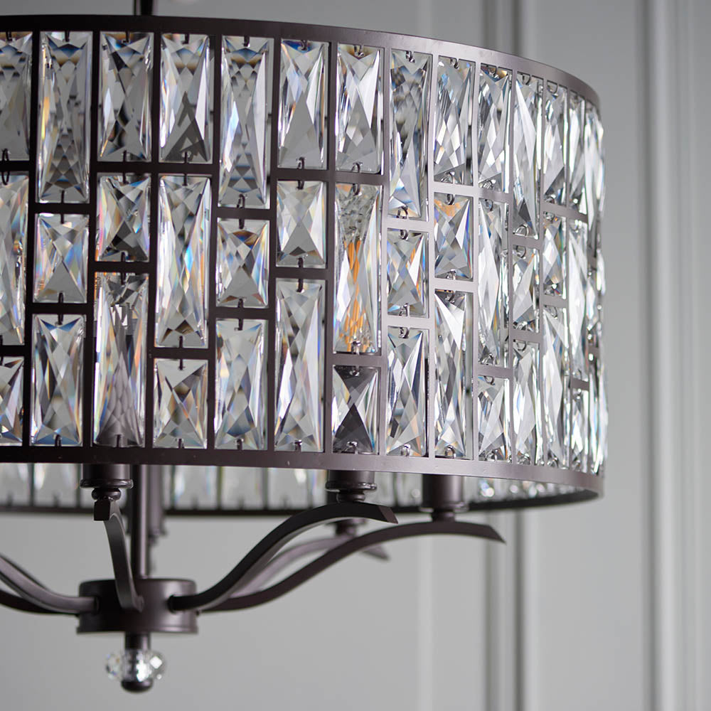 Refined dark bronze effect metalwork highlighting the luxurious character of the Belle Pendant