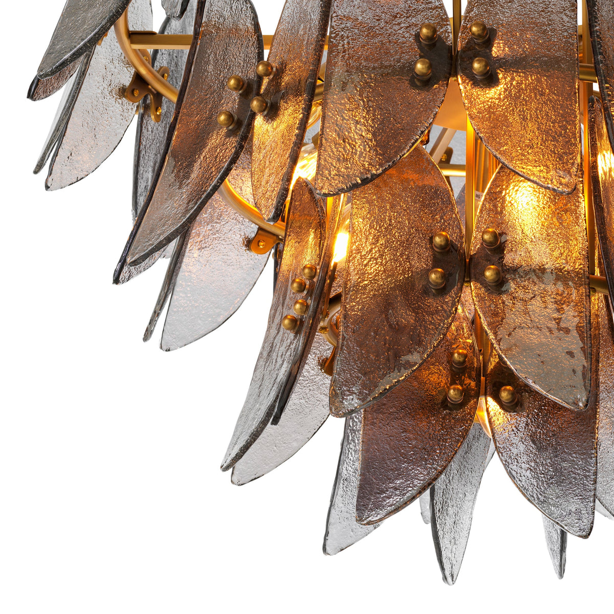 Refined antique brass framework complementing the sculptural glass arrangement