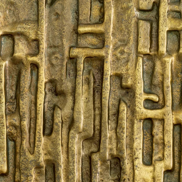 Close-up of the richly textured surface and intricate relief detailing