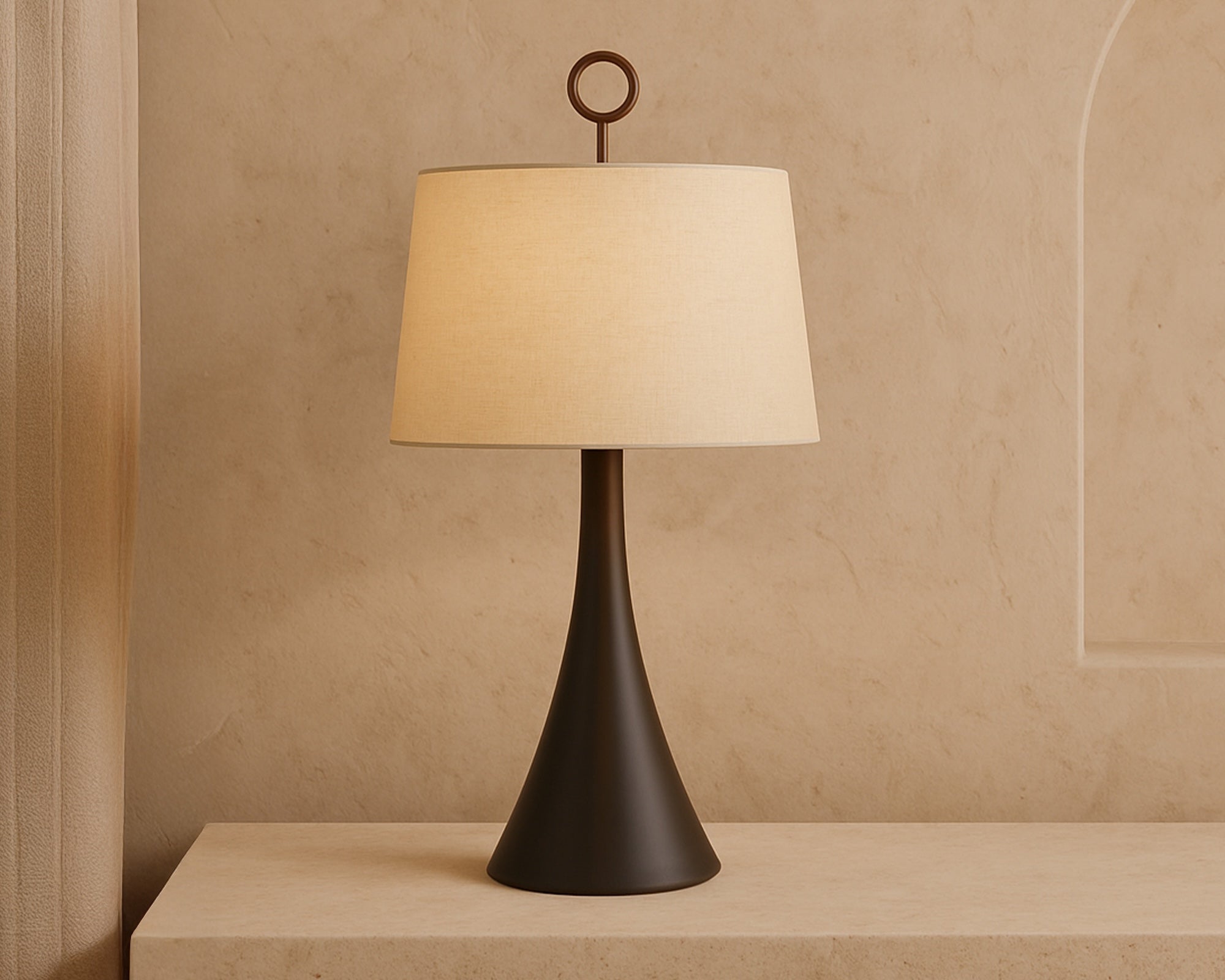 Leila Table Lamp by Liang & Eimil featuring an antique hairline bronze base and off-white linen shade