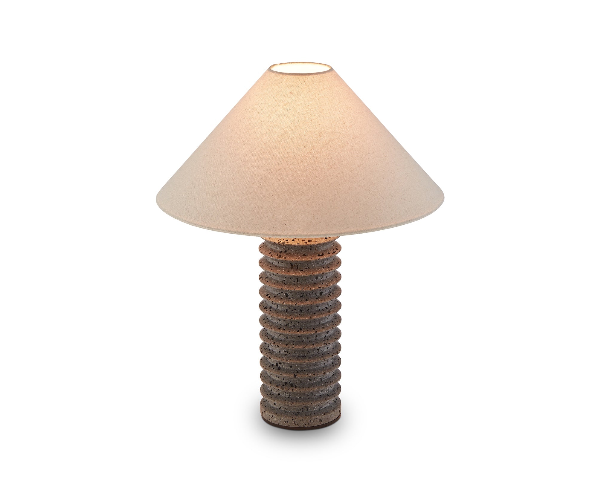 Carson Table Lamp by Liang & Eimil featuring a tiered dark travertine base with antique bronze detailing and a grey linen shade