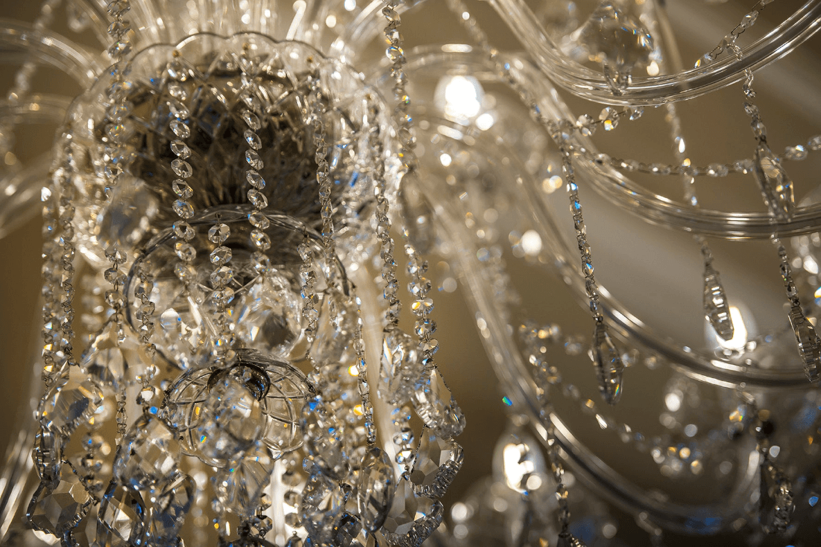 Luxury crystal chandelier in an elegant lounge interior – Luxury Lighting Boutique