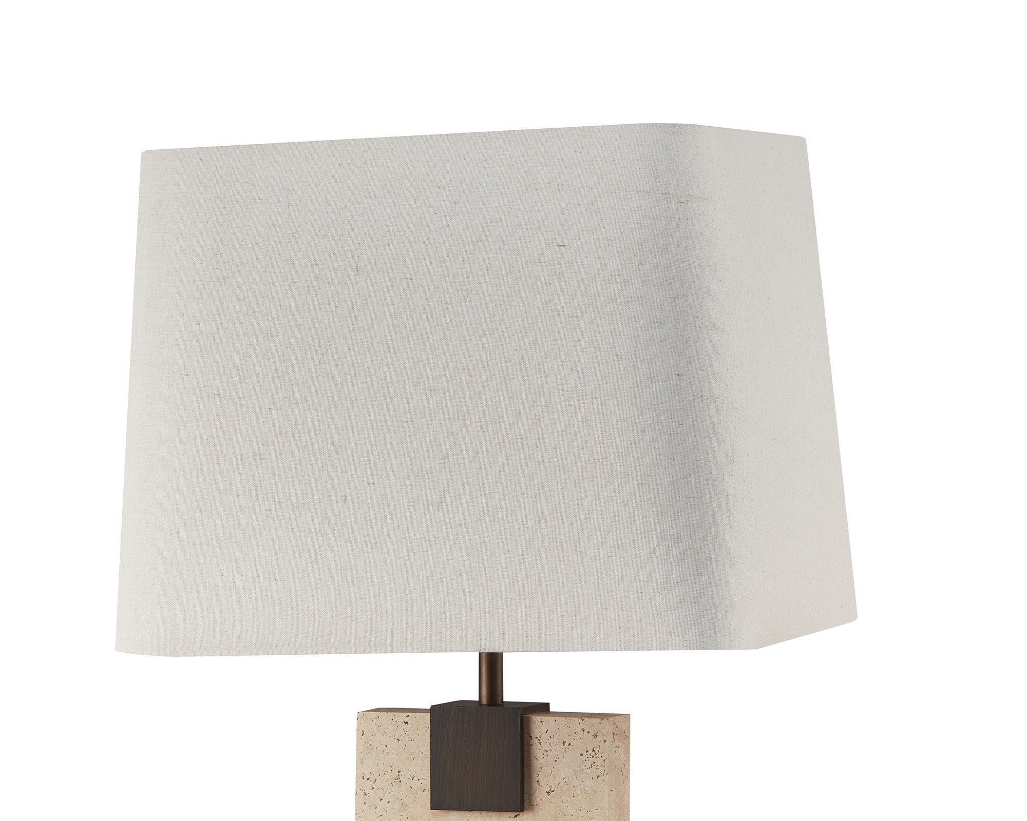 Madison Table Lamp by Liang & Eimil featuring an open pore travertine base and off-white linen shade