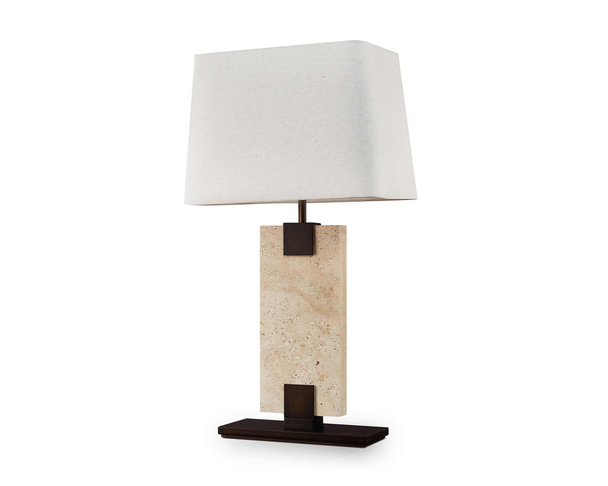 Madison Table Lamp by Liang & Eimil featuring an open pore travertine base and off-white linen shade