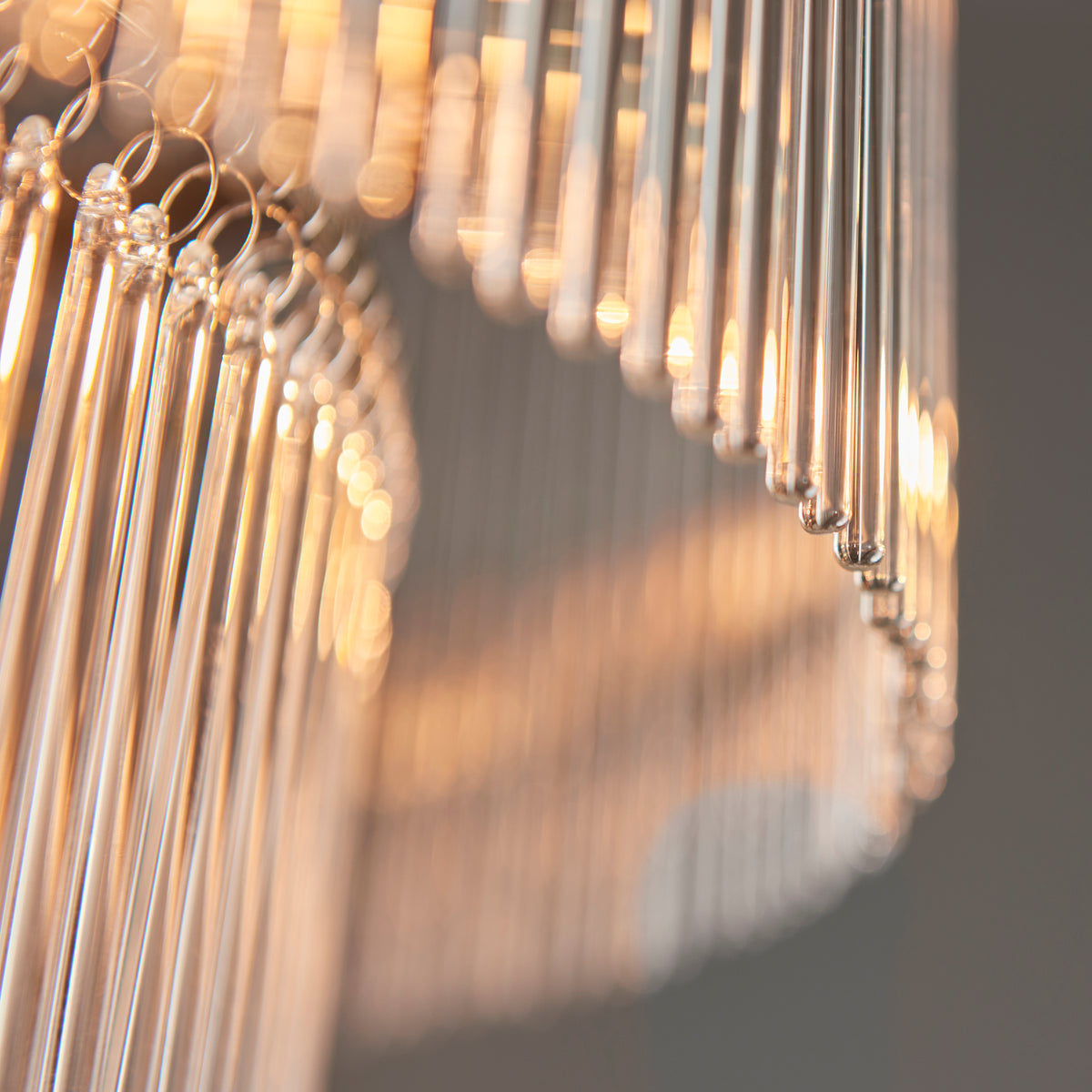 Marietta 16Lt Pendant illuminated to reveal the delicate diffusion of light through the glass rods