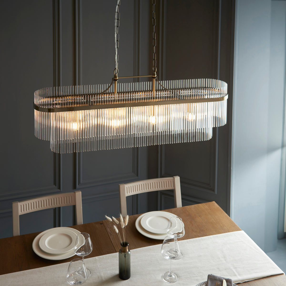 Marietta 4Lt Linear Pendant complementing a refined contemporary dining interior