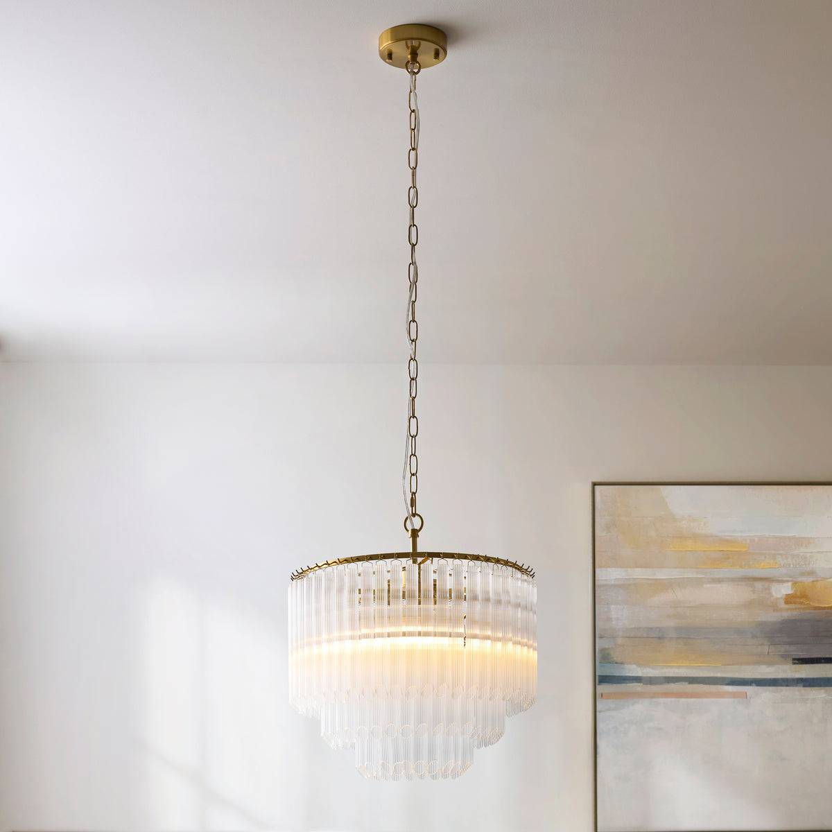 Side profile revealing the pendant's sculptural proportions and tiered silhouette