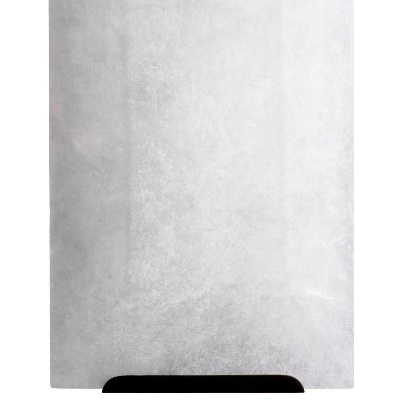 Ortiz Wall Lamp creating a warm, softly diffused glow through natural alabaster