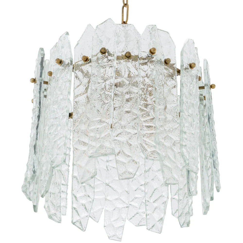 Detailed view of the luxurious textured glass elements catching and refracting the light.