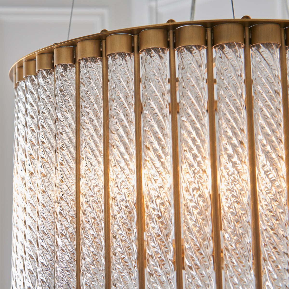 Refined matt gold metalwork highlighting the luxurious character of the Romola Pendant