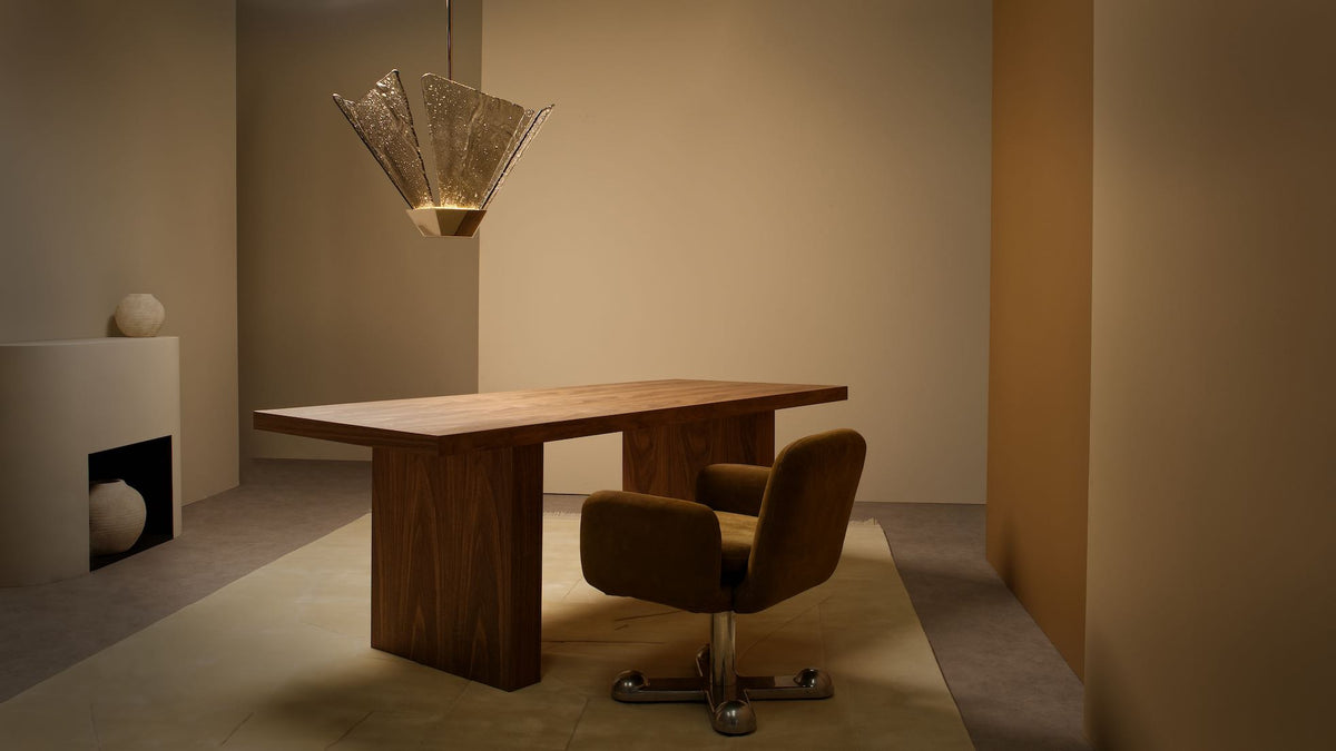 Shard Pendant showcasing sculptural forms with luxurious bronze kiln glass and refined metal detailing