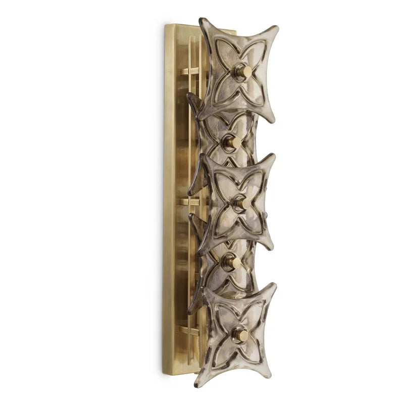 Silvaris Wall Lamp by Eichholtz showcasing five sculptural smoke-glass elements and a refined vintage brass finish