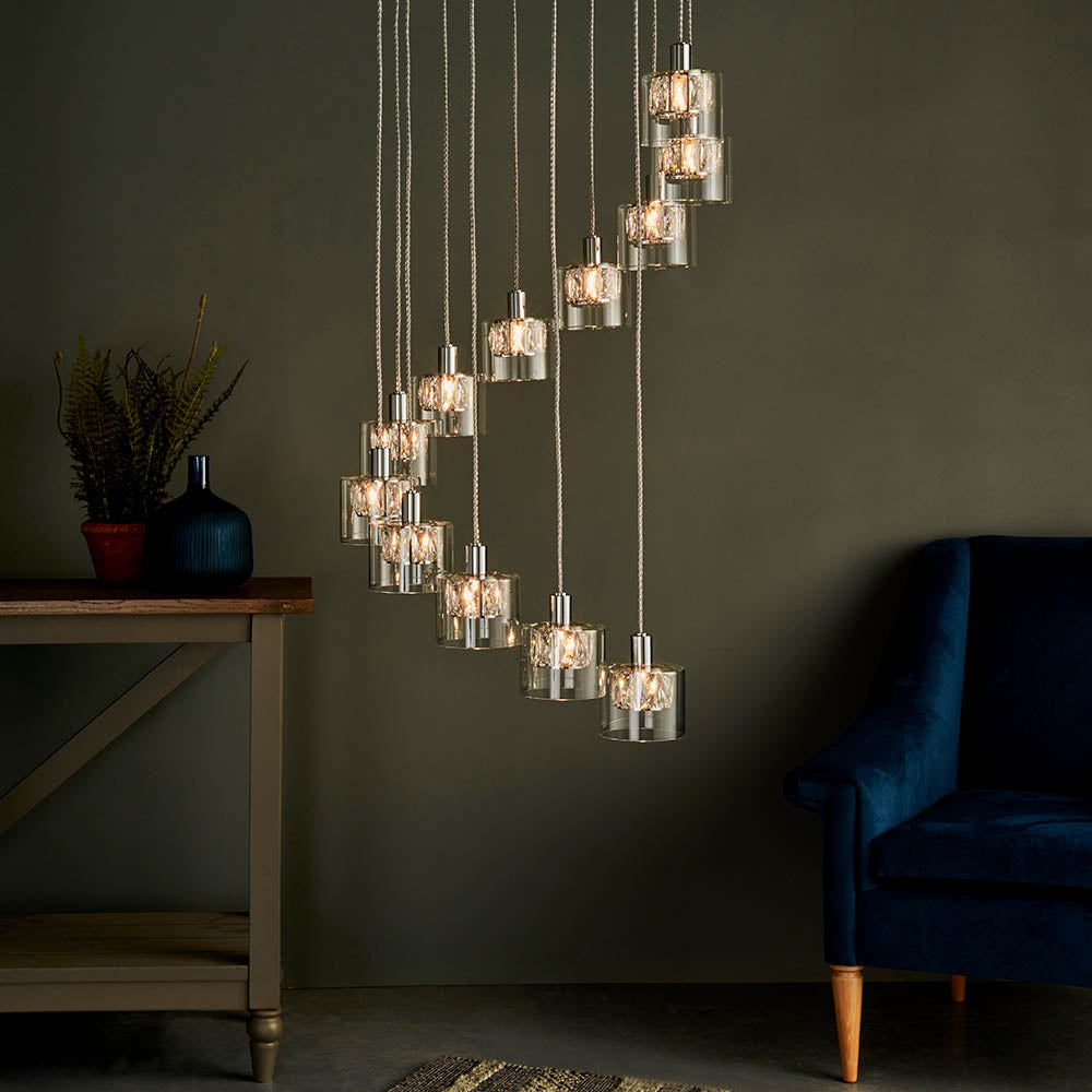 Verina 12Lt Pendant adding refined crystal illumination to a luxurious living room